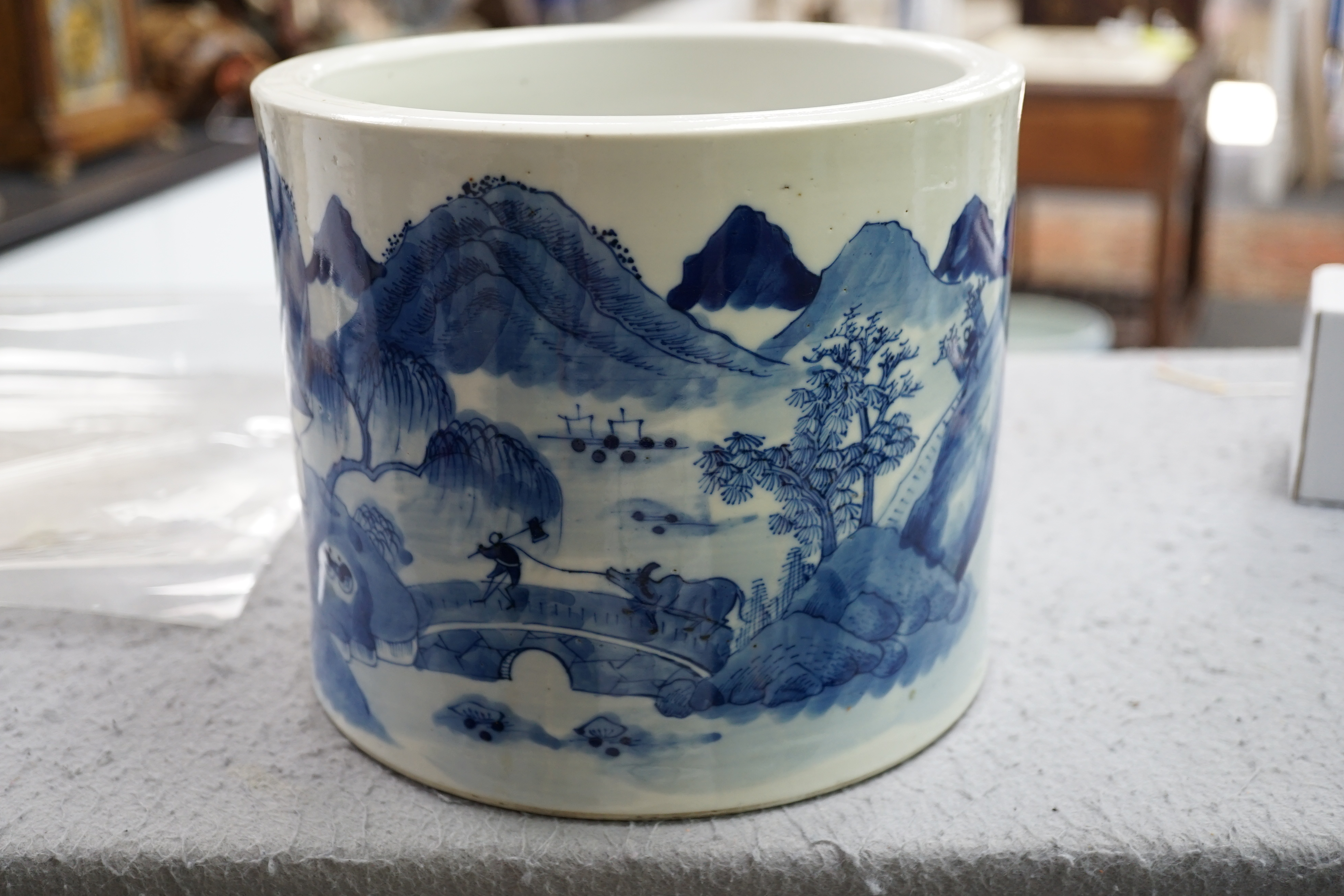 A Chinese blue and white ‘landscape’ cylindrical brushpot, bitong, 19th century